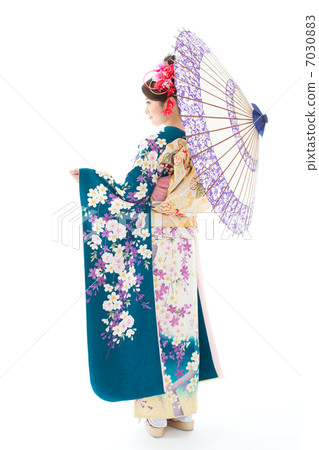 Woman in long-sleeved kimono Woman in long-sleeved kimono 7030883