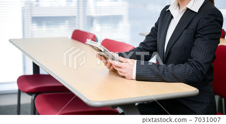 OL with tablet in conference room OL with tablet in conference room 7031007
