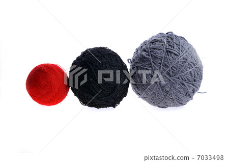 three yarn balls on white 7033498