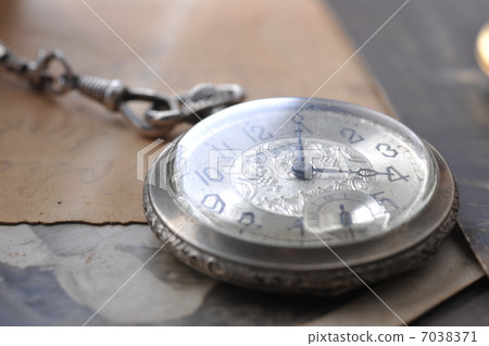 old watch on the grungde post card and photo 7038371