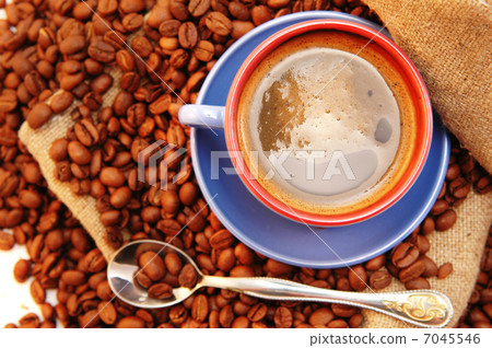coffee beans cup with coffee and spoon coffee beans cup with coffee and spoon 7045546