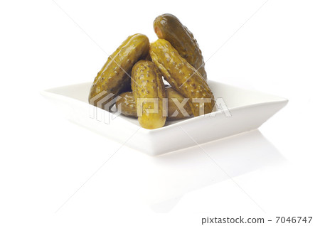 pickles on plate isolated on white pickles on plate isolated on white 7046747