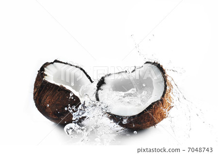 cracked coconut splashing 7048743