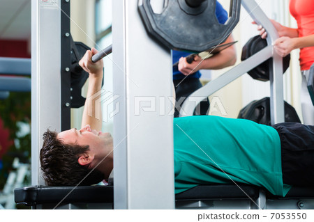 Man and Personal Trainer in gym Man and Personal Trainer in gym 7053550