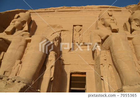 The sun god Ra at the entrance of Abu Simbel Great Temple and Ramesses II and Queen Nefertari statue 7055365