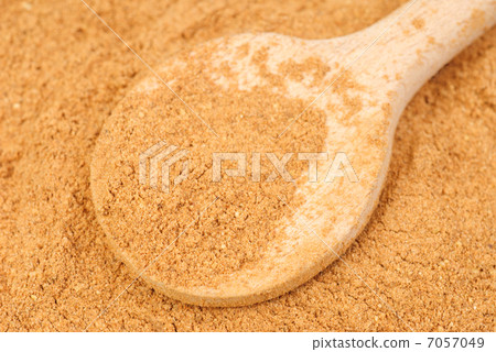 Cinnamon  powder and wooden spoon as  nature  food   background 7057049