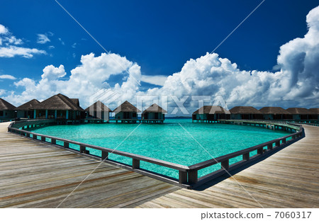 Beautiful beach with water bungalows 7060317