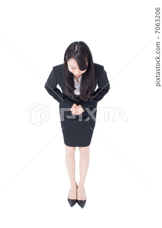 A woman bowing A woman bowing 7063206