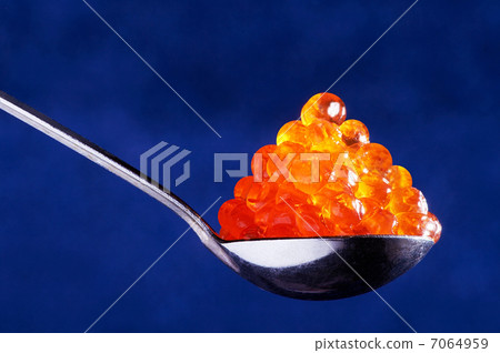 Red caviar in the spoon 7064959