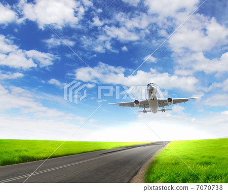Airplane in blue cloudy sky 7070738