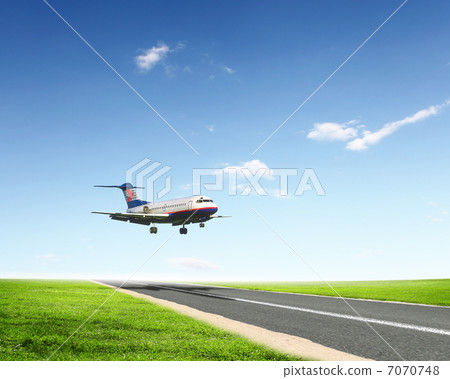 Airplane in blue cloudy sky Airplane in blue cloudy sky 7070748
