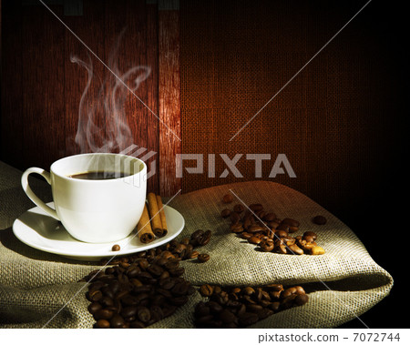 Steaming cup of coffee Steaming cup of coffee 7072744