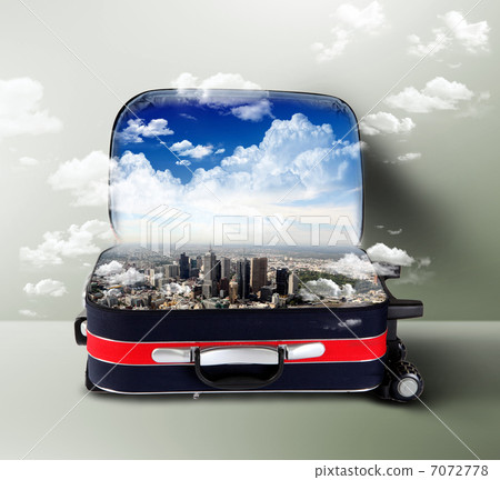 Red suitcase with city inside Red suitcase with city inside 7072778