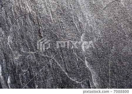Natural pattern of a stone wall 7088800