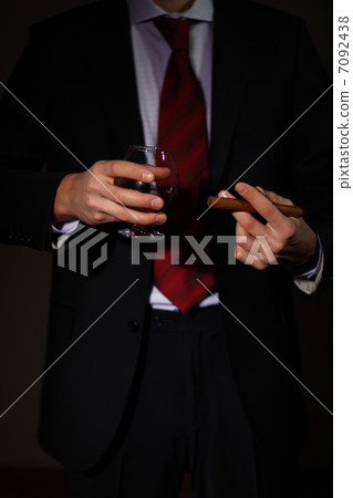 Man with cognac and cigar 7092438