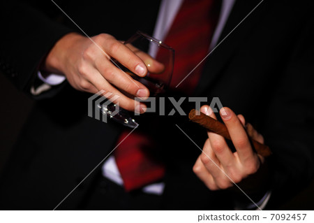 Man with cognac and cigar 7092457