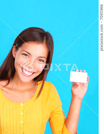 Woman showing business card / sign 7095966
