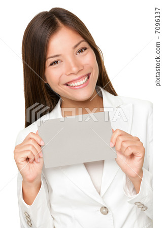 Vivacious Asian woman with grey card Vivacious Asian woman with grey card 7096137