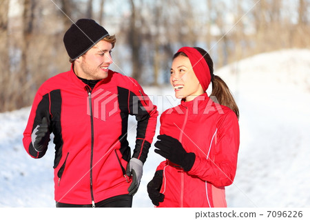 Couple running in winter Couple running in winter 7096226