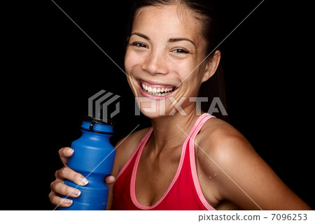 Attractive fitness sportswoman on black background Attractive fitness sportswoman on black background 7096253