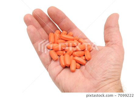 pill in a hand 7099222