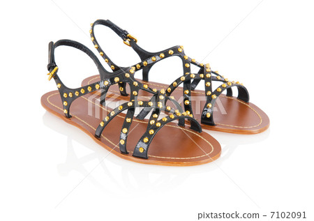Woman sandals isolated on the white Woman sandals isolated on the white 7102091