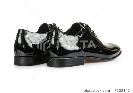 Fashion concept with male shoes on white Fashion concept with male shoes on white 7102142