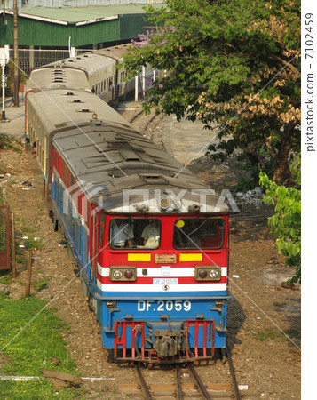 Train departing from Yangon central station 7102459