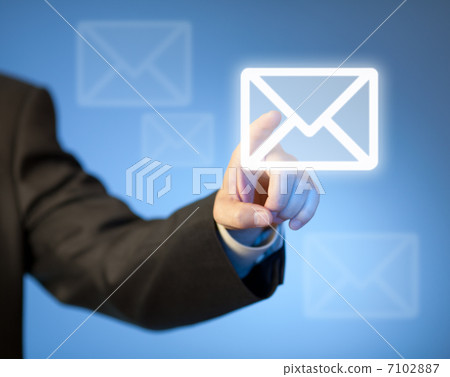 Hand pressing virtual mail button 7102887