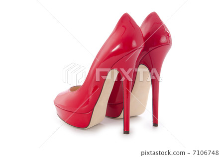 Red stylish woman shoes isolated on the white 7106748
