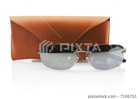 Elegant sunglasses isolated on the white Elegant sunglasses isolated on the white 7106781