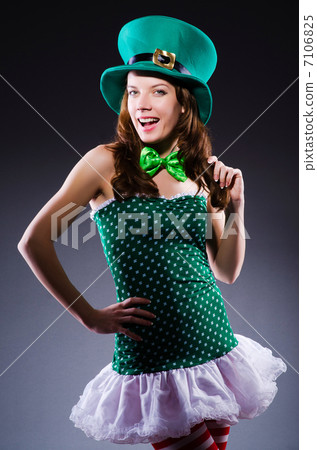 Young girl in saint patrick celebration concept Young girl in saint patrick celebration concept 7106825