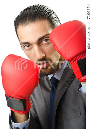 Businessman with boxing gloves on white 7106854