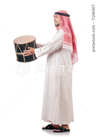 Arab man playing drum isolated on white Arab man playing drum isolated on white 7106907