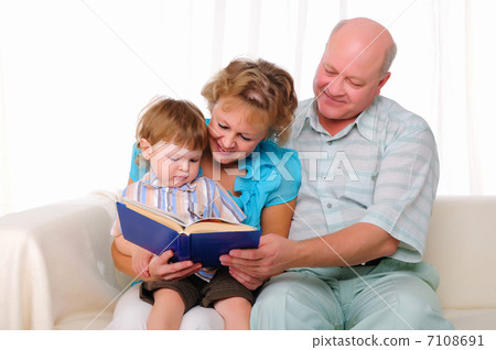 Grandmother, grandfather and grandson 7108691