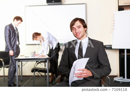 a young businessman in office 7109118