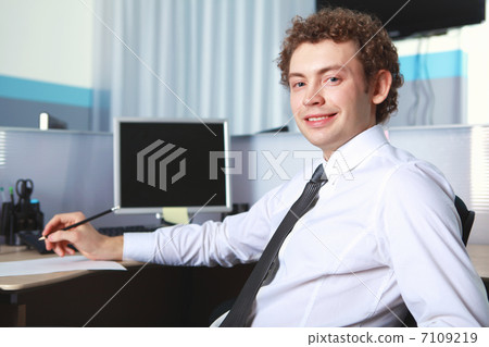 a young businessman in office 7109219