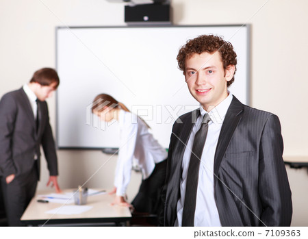 a young businessman in office 7109363