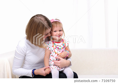 Mama and her little daughter Mama and her little daughter 7109750
