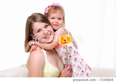 Mama and her little daughter Mama and her little daughter 7109804