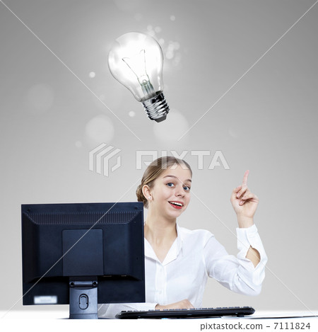 Businesswoman at workplace and money symbols Businesswoman at workplace and money symbols 7111824