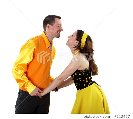 young dancing couple in bright colour wear young dancing couple in bright colour wear 7112457
