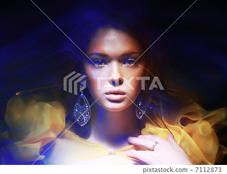 Color. Portrait of Trendy Woman in Soft Fantastic Lights Color. Portrait of Trendy Woman in Soft Fantastic Lights 7112873