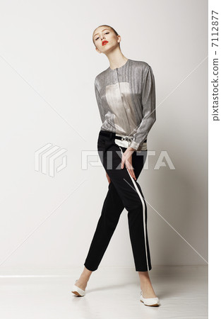Lifestyle. Sporty Slim Woman in Black Pants - Summer Collection. Glamor 7112877