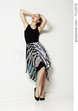 Springtime Seasonal Design. Caucasian Sensual Woman wearing Casual Clothes Springtime Seasonal Design. Caucasian Sensual Woman wearing Casual Clothes 7112878