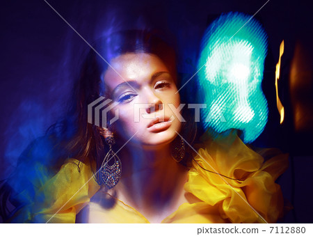 Motion. Stylized Woman in Radiant Abstract Lights. Illusion Motion. Stylized Woman in Radiant Abstract Lights. Illusion 7112880