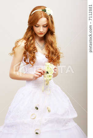 Tenderness & Romance. Red Hair Bride with Fresh Flowers in Reverie. Wedding Style 7112881