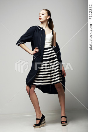 Ambitions. Confident Honorable Brunette in Black Waterproof Mackintosh. Vogue Style Ambitions. Confident Honorable Brunette in Black Waterproof Mackintosh. Vogue Style 7112882