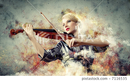 Gorgeous woman playing on violin 7116535