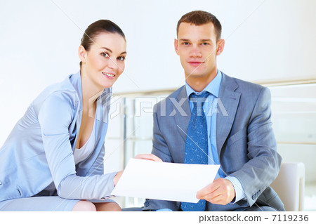 a portrait of a businesswoman and businessman a portrait of a businesswoman and businessman 7119236